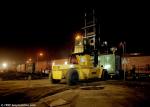 ID 6460 A trial containerised shipment of china clay is loaded aboard a train in Southampton's Western Docks, England.